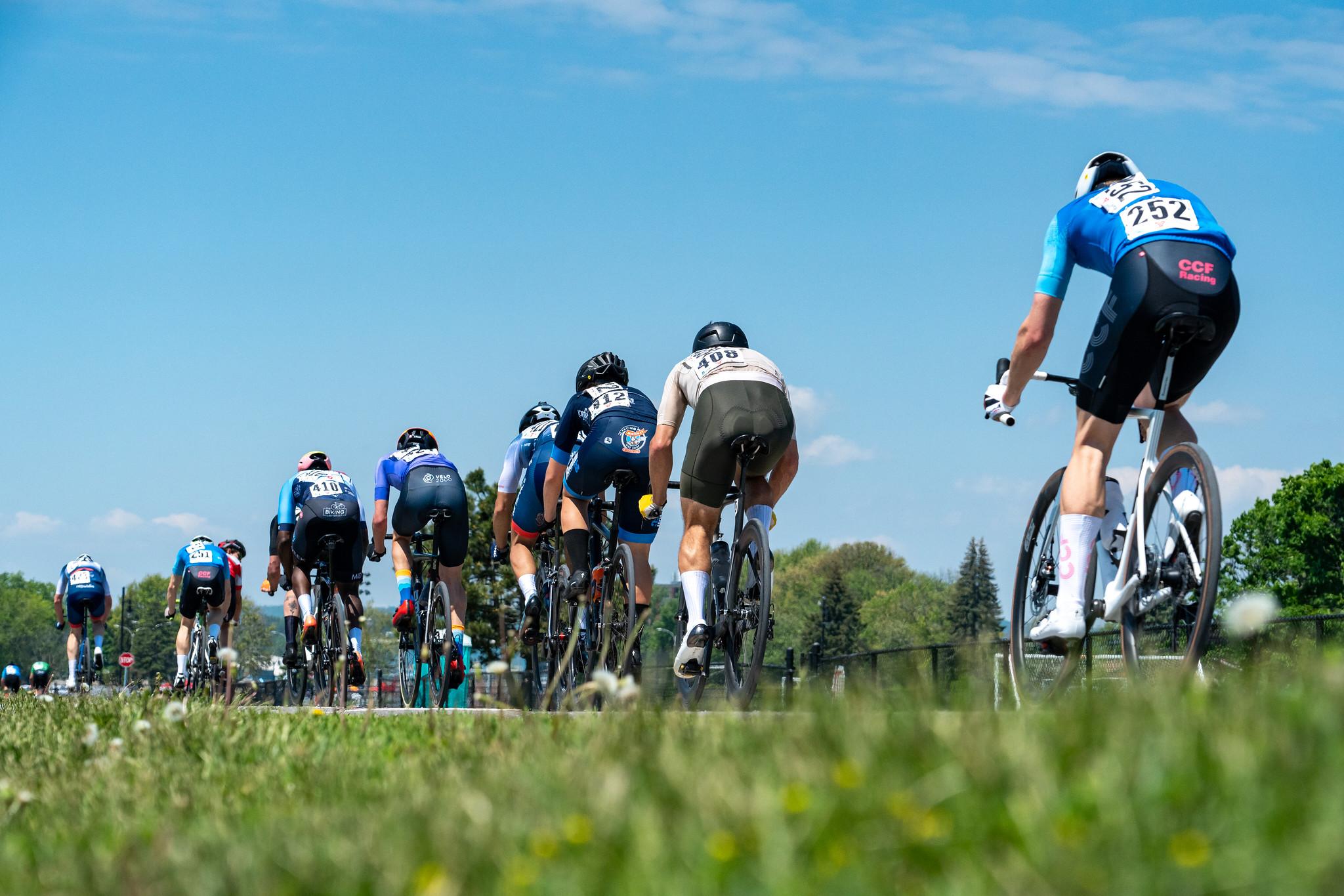 Beginner category riders in a paced group