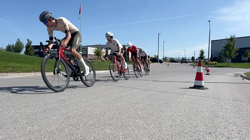 A line of YDCS racers riding through the Uxbridge course